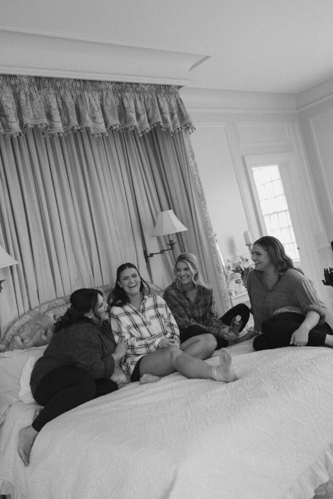 The bride before getting ready, hanging out with her bridesmaids.